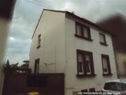 Einfamilienhaus mit Anbau und Schuppen