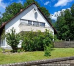Einfamilienhaus und Grundstück