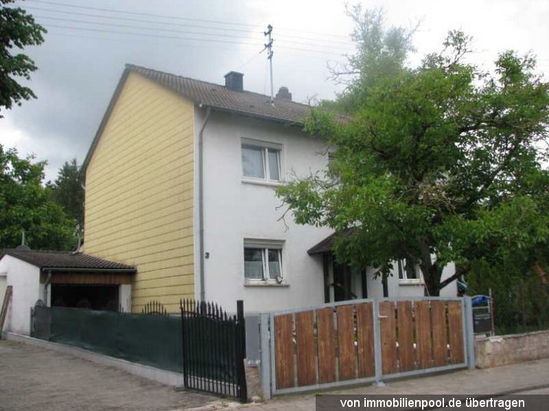 Einfamilienhaus und unbeb. Grundstück