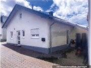 Einfamilienhaus mit Carport und Anteile an Verkehrsflächen