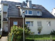 Mehrfamilienwohnhaus mit Garagen