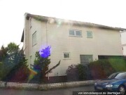 Einfamilienhaus und Ackerland