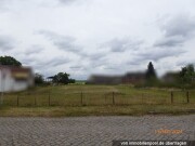 unbebautes Grundstück und überbaute Arrondierungsfläche