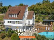 Einzigartiges Einfamilienhaus in angenehmer Hanglage mit Pool & groß…