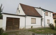 Einfamilienhaus mit Nebengebäuden
