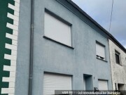Reihenmittelhaus mit Garagen- und Gartengrundstück