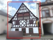 Wohn- und Geschäftshaus mit Pkw-Stellplatz