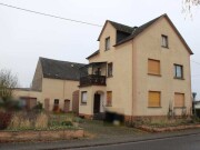 Einfamilienhaus mit Anbau, Scheune und Garage