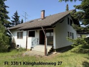 Einfamilienhaus, Wohn-und Ökonomiegebäude, Gartenland und Ackerland