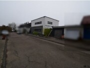 Wohnhaus mit Garage und Nebengebäude