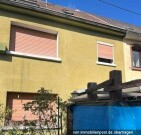 Einfamilien-Reihenhaus mit Garage und Wiese