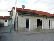 Einfamilienhaus mit Garage und Wohnhaus mit Lagergebäude