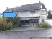 Einfamilienhaus mit Garagen