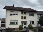 Mehrfamilienhaus mit Nebengebäude