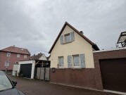Einfamilienhaus mit Nebengebäude und Garage