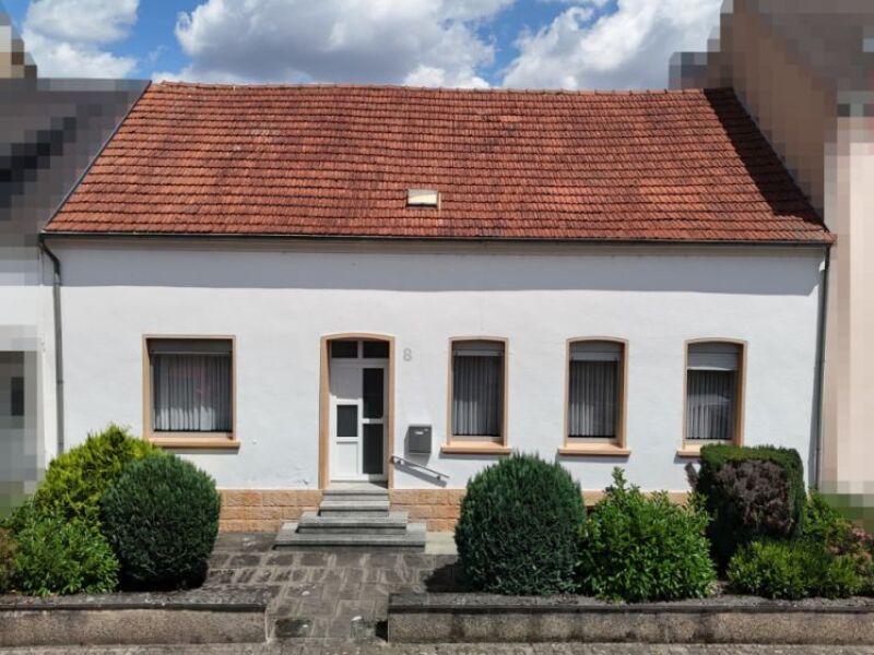 Gepflegtes Reihenmittelhaus mit Garten und Ausbaupotenzial in zentra…
