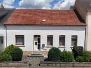 Gepflegtes Reihenmittelhaus mit Garten und Ausbaupotenzial in zentraler Lage von Saarlouis