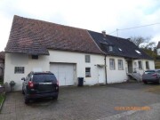 Einfamilienhaus mit Nebengebäuden sowie weiteren Grundstücken