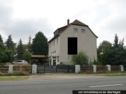 Wohn- und Geschäftshaus mit Nebengebäuden