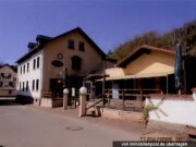 Hotel, Wohnhaus, Pferdestall und unbebaute Grundstücke