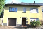 Einfamilienhaus und hausnahes Gartenland