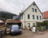 Einfamilienhaus mit Einliegerwohnung und integrierter Garage