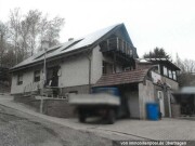 Einfamilienhaus mit Garage und Garten