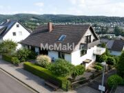 Großzügiges Einfamilienhaus mit vermieteter Einliegerwohnung und Wei…