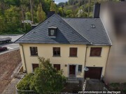 Wohn- und Geschäftshaus mit Garage