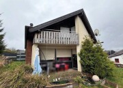 Einfamilienhaus mit Garage und Anteil an Garagengrundstück