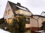 Einfamilienhaus mit integrierter Garage