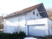 Zweifamilienwohnhaus mit Garagenanbau sowie Carport/Schuppen