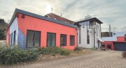 Gewerbeimmobilie mit Fertigungsräumen, Büros, Lager und 2 Wohnungen
