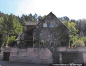 1/2 Anteil an Wohn- und Geschäftshaus sowie an Waldflächen